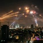 Iran Fires Cluster Missiles at Central Israel on Day 27 of War